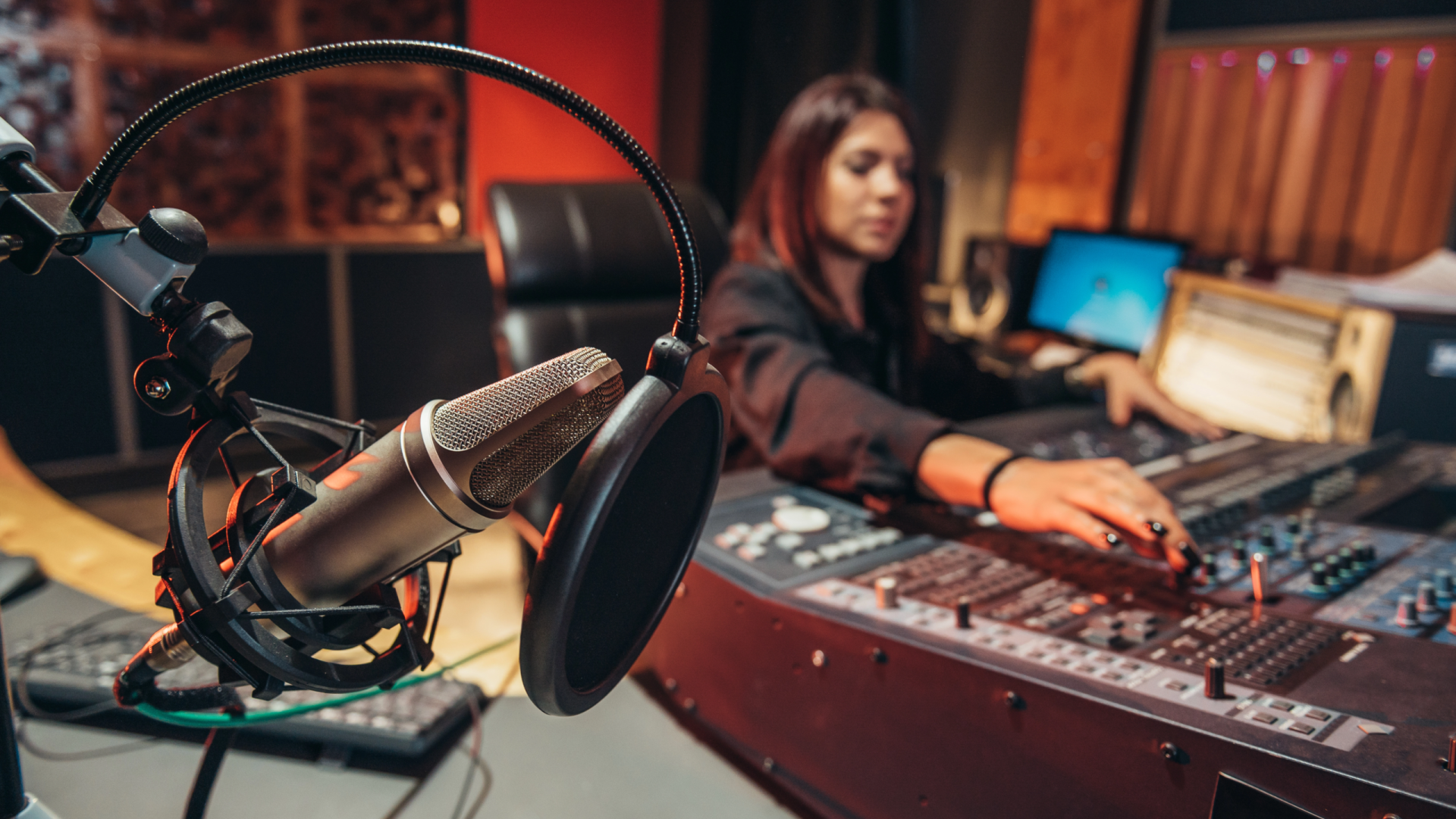 young-woman-music-producer-working-on-a-mixing-sou-2023-11-27-05-34-33-utc